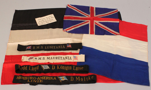 A seven-piece lot of early cruise and transport ship items includes a rare hat band/cap tally from the ill-fated Lusitania. Estimate: $2,000-$2,400. Image courtesy of Case Antiques.